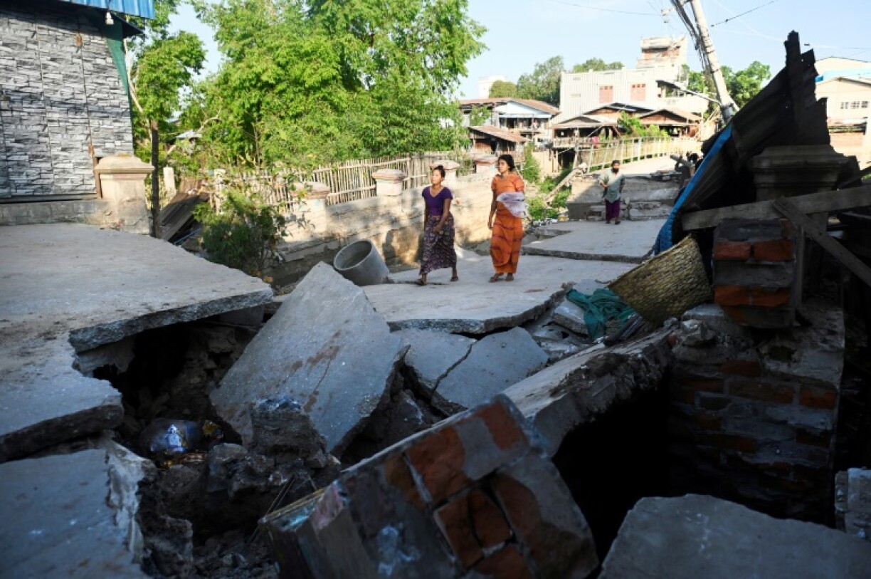 Thousands marked the start of Myanmar's water festival in the ruins of last month's earthquake, with the country's most raucous holiday muted by the tragedy of the tremor