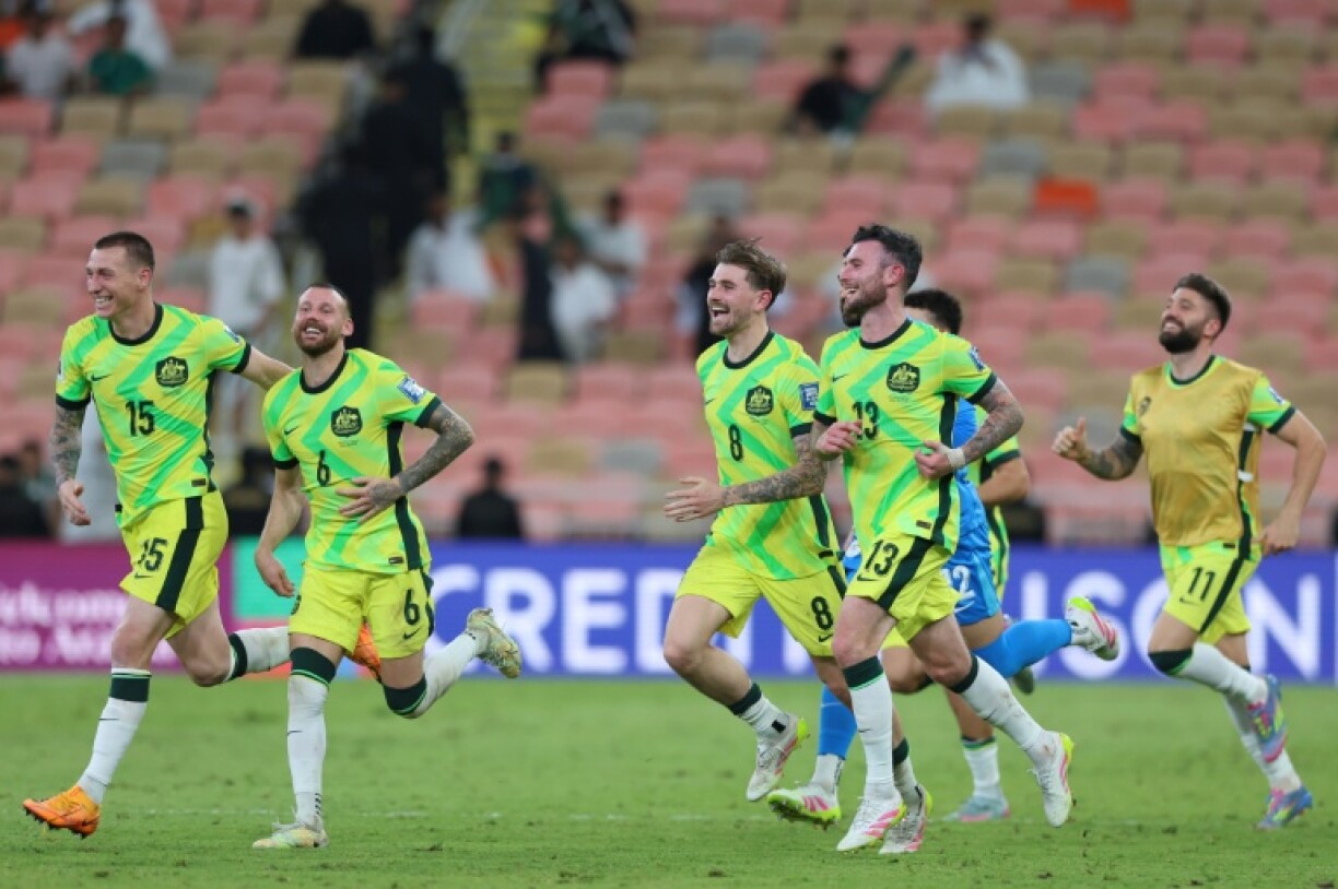 Australia's players celebrate reaching the World Cup