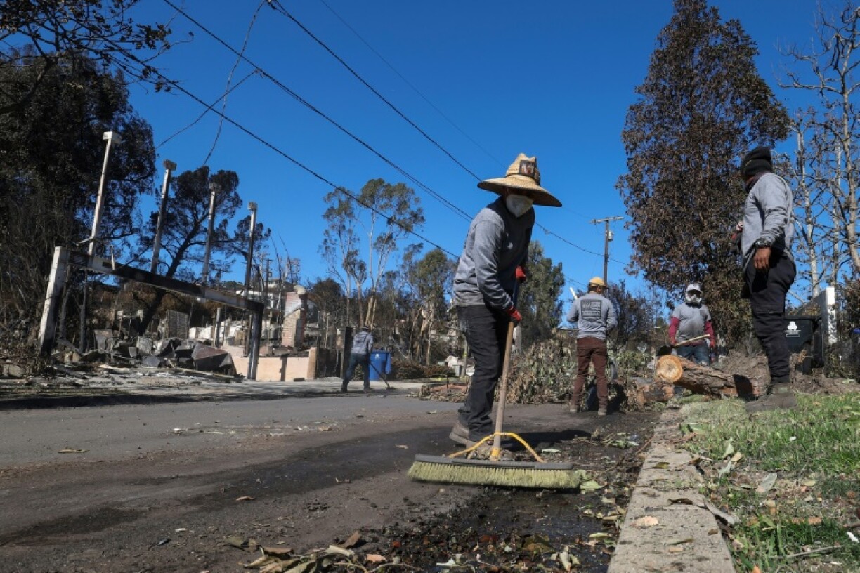 Some locals are not waiting for the official clean up and have started fixing the streets themselves