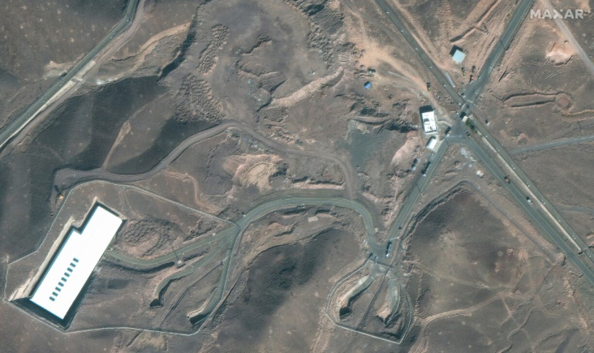 This handout satellite image courtesy of Maxar Technologies shows cargo trucks postioned near an underground entrance to Iran's Fordow Fuel Enrichment Plant (FFEP), in Fordo, Iran on June 20, 2025