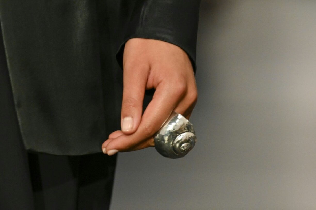 For accessories, Lauren offered oversized silver jewelry, textured bags, and shoes of varying heights