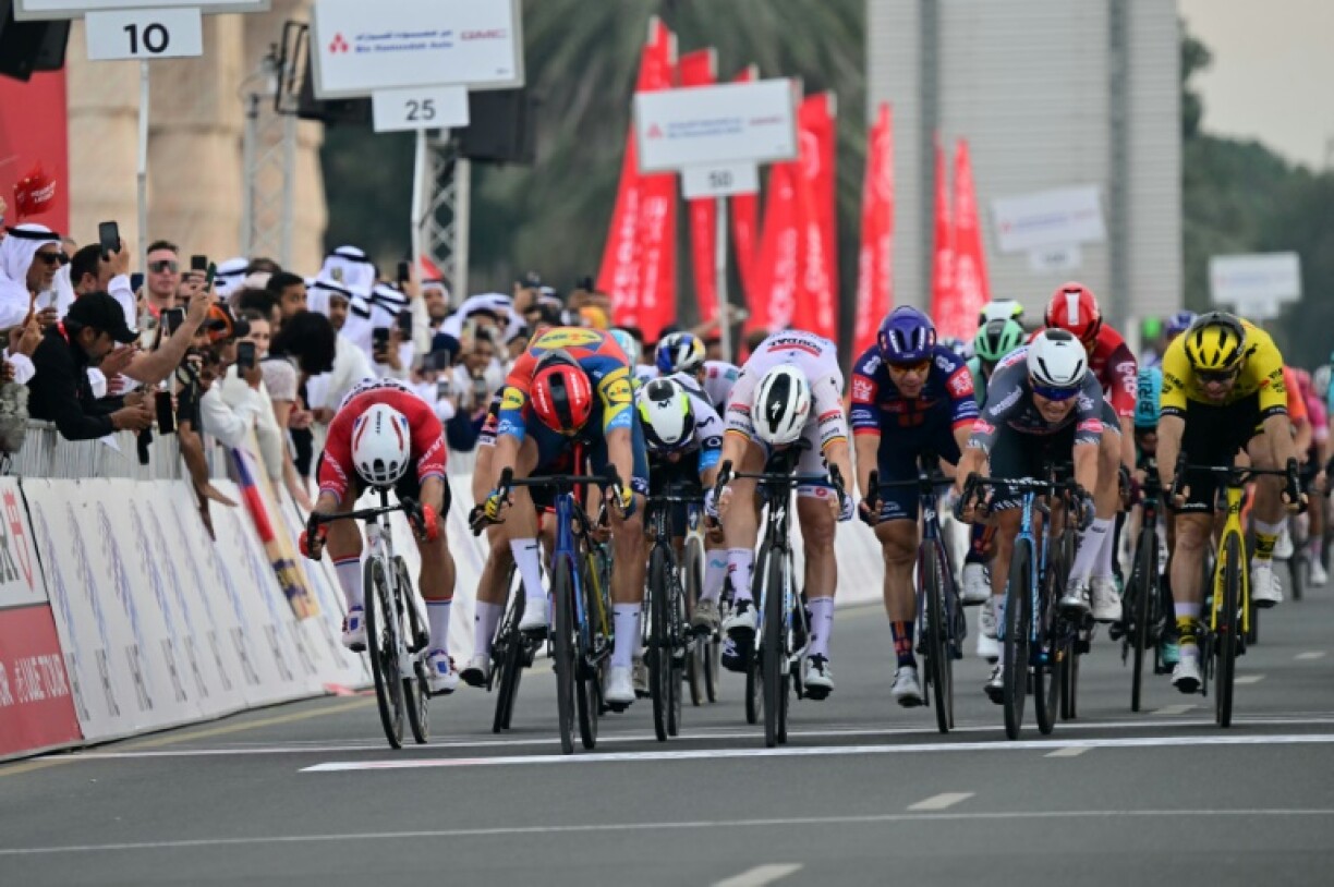 Jonathan Milan (2nd left) sprints to his second stage win on the UAE Tour