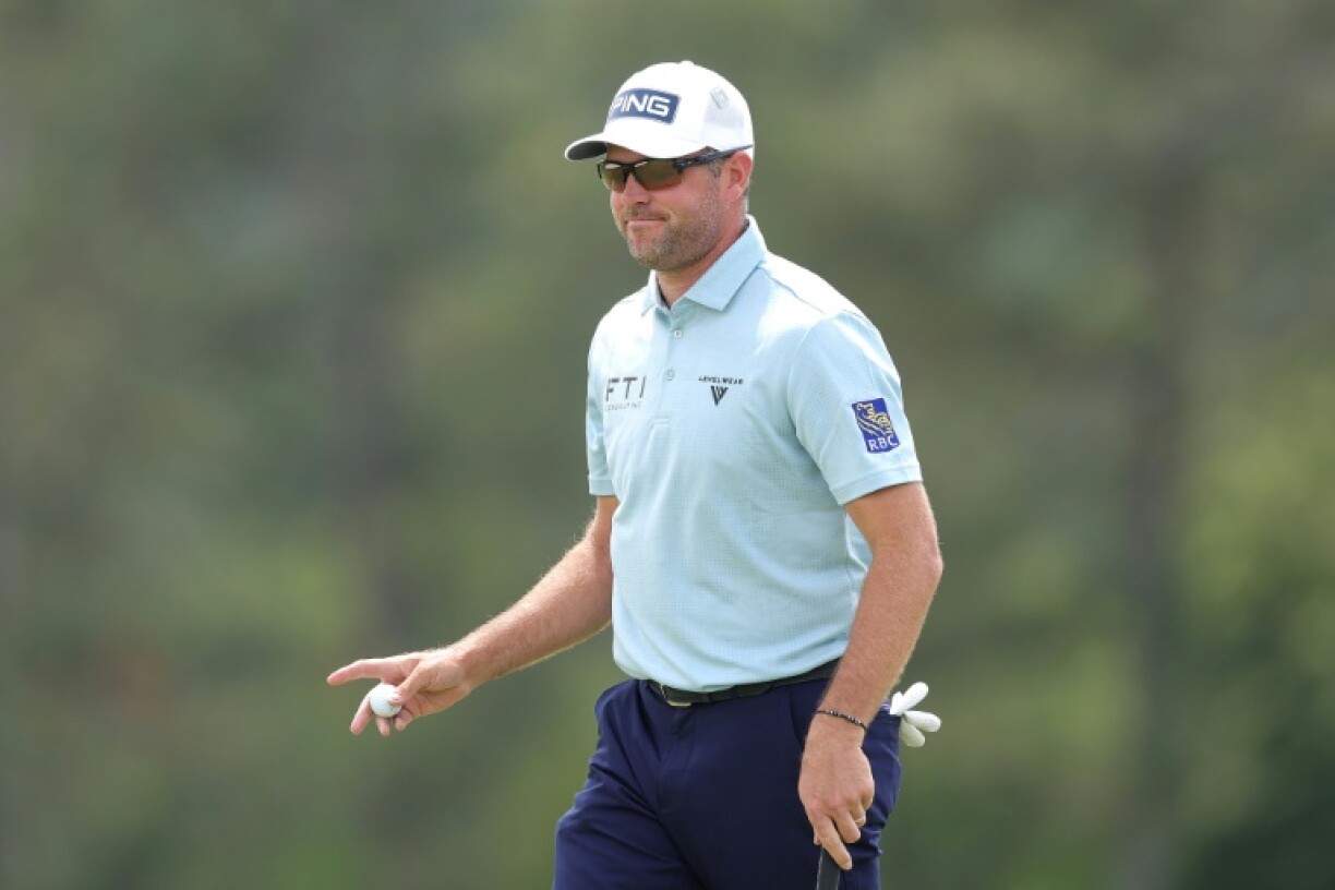 Canadian Corey Conners reacts on the 18th green during the first round of the Masters at Augusta National