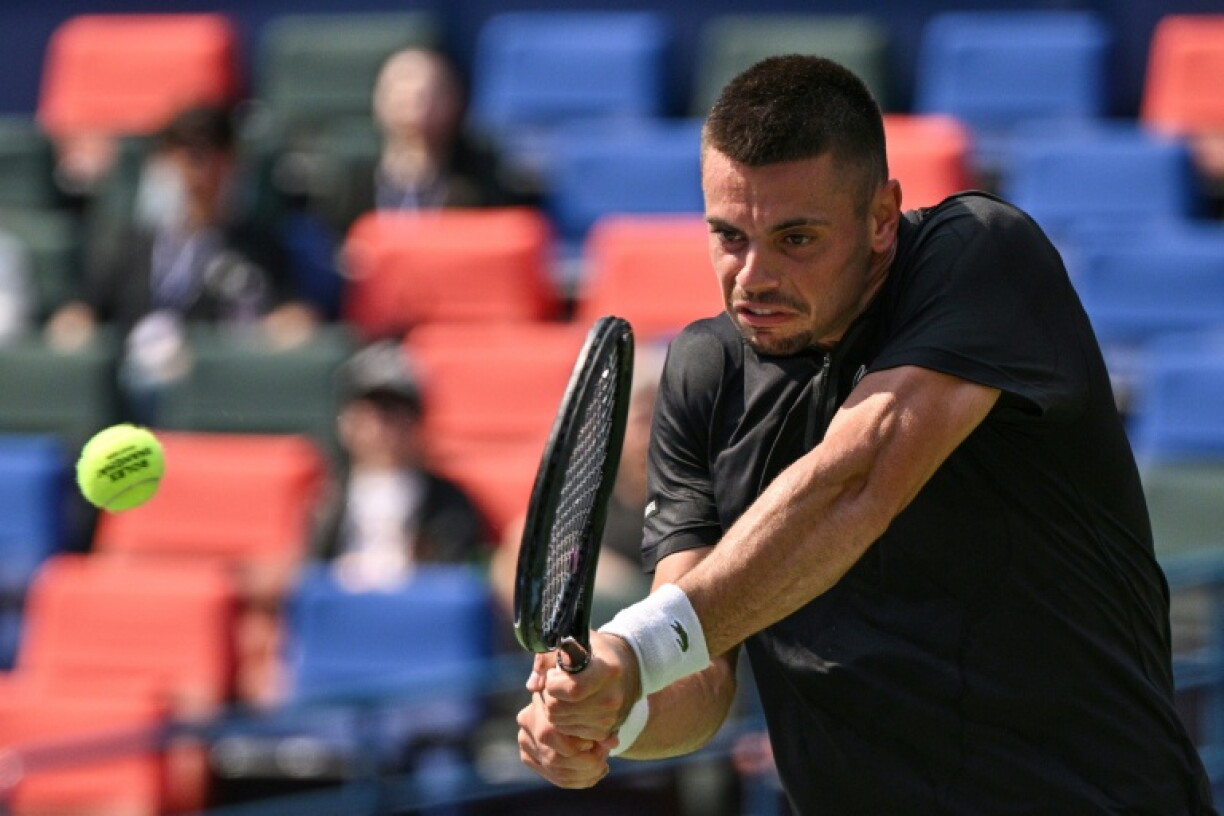 France's Arthur Gea hits a return to USA's Ben Shelton