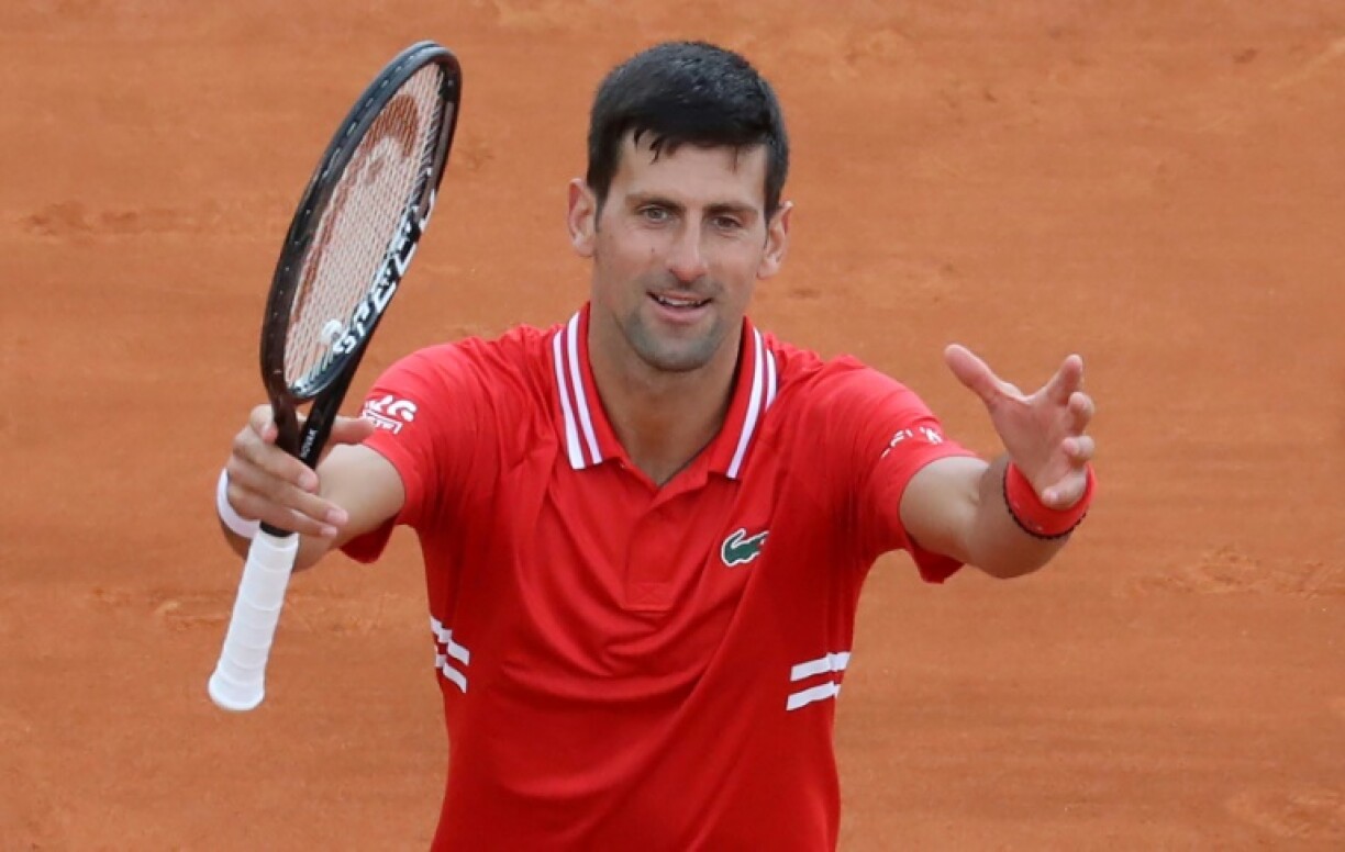 Le Serbe Novak Djokovic satisfait après sa victoire sur l'Italien Jannik Sinner au 2e tour du Masters 1000 de Monte-Carlo, le 14 avril 2021