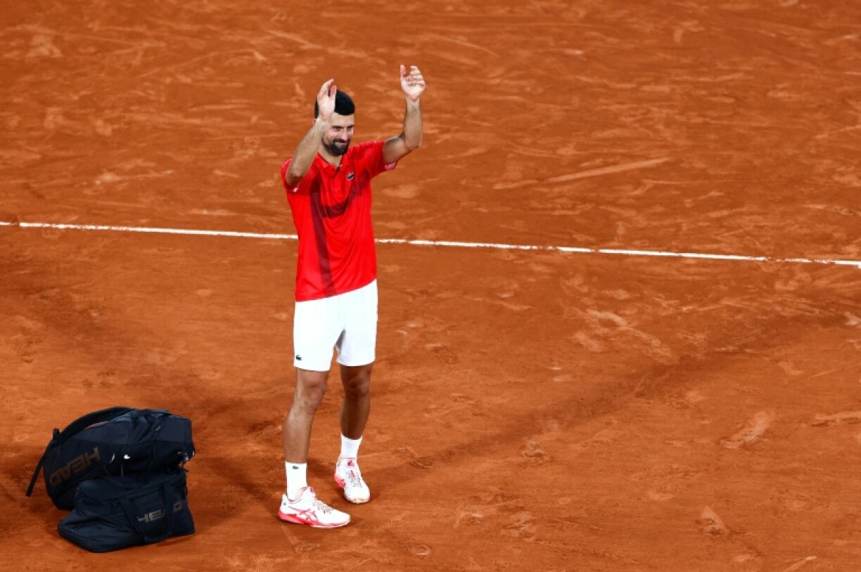 Novak Djokovic stepped back on court after his semi-final loss to hail the crowd in Paris