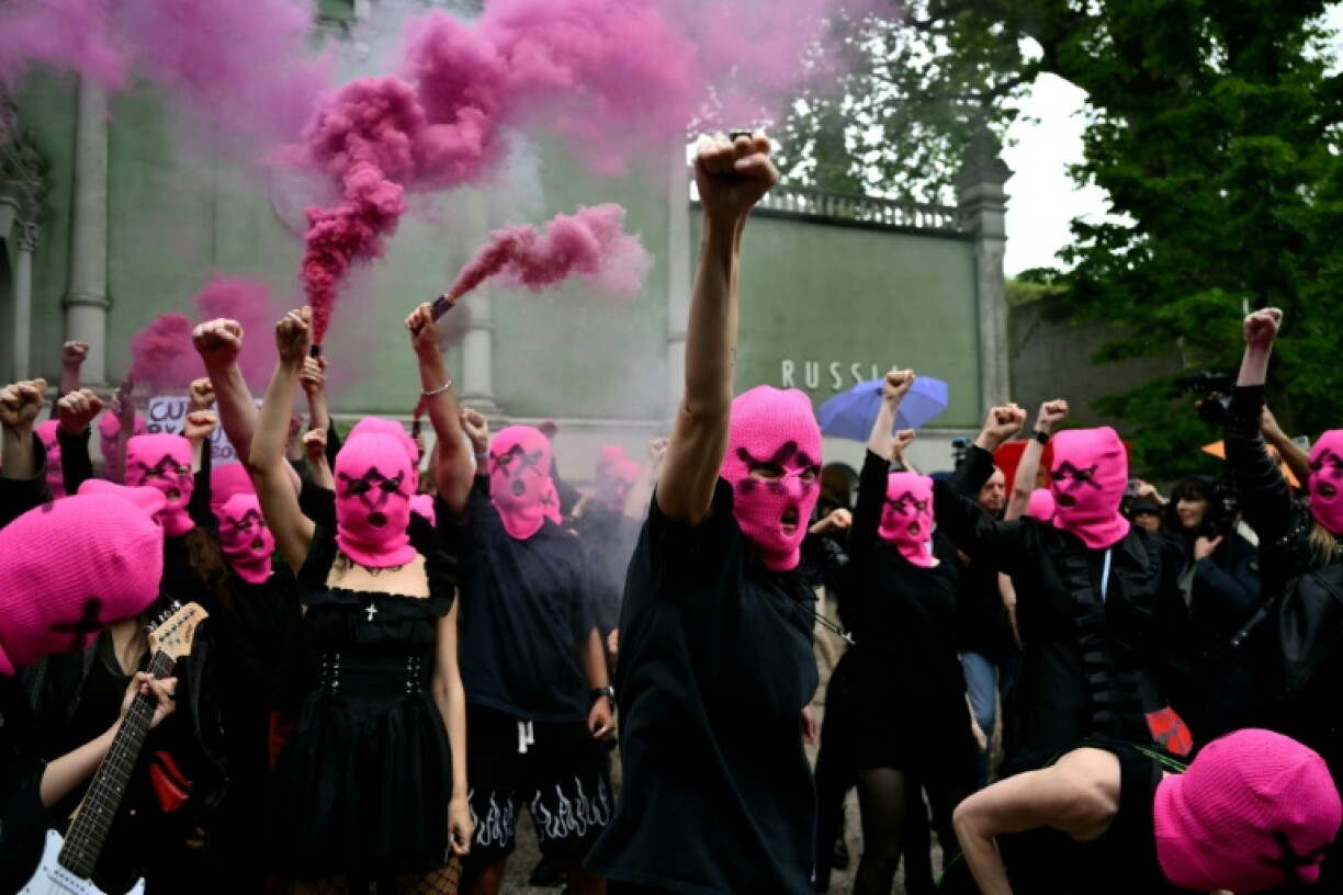 International women's movement FEMEN and Pussy Riot activists protested against Russia's involvement in the Biennale in May