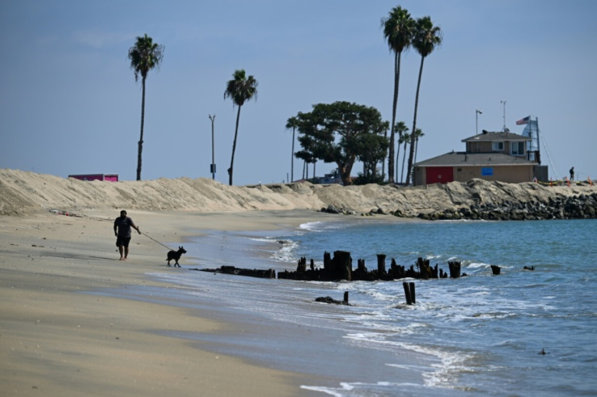 Sand berms have been built along beaches in Southern California in anticipation of storms hitting the area