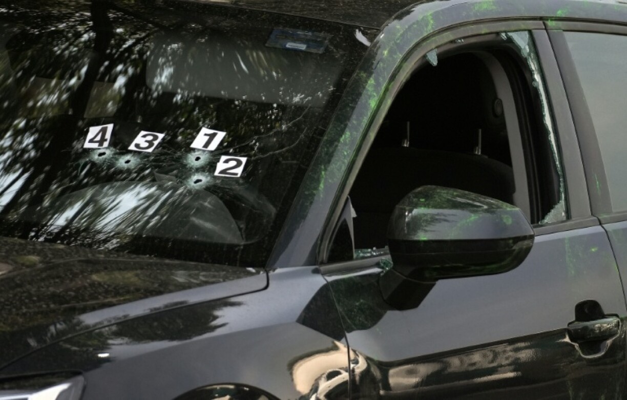 Bullet holes left by the attack that killed two aides of Mexico City's mayor in May