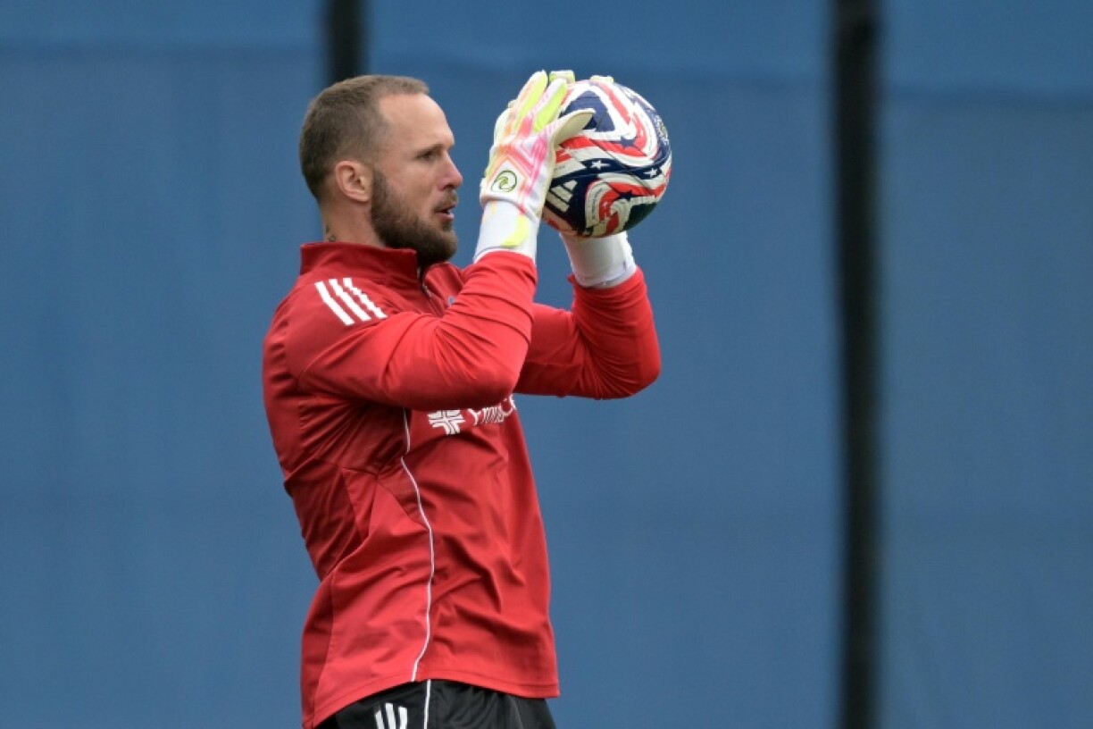 Seattle Sounders goalkeeper Stefan Frei said he was home and resting after being kneed in the head in the final moments of an MLS home draw against Columbus