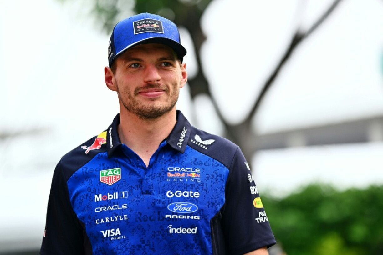 Max Verstappen arrives in the paddock before the Formula One Singapore Grand Prix