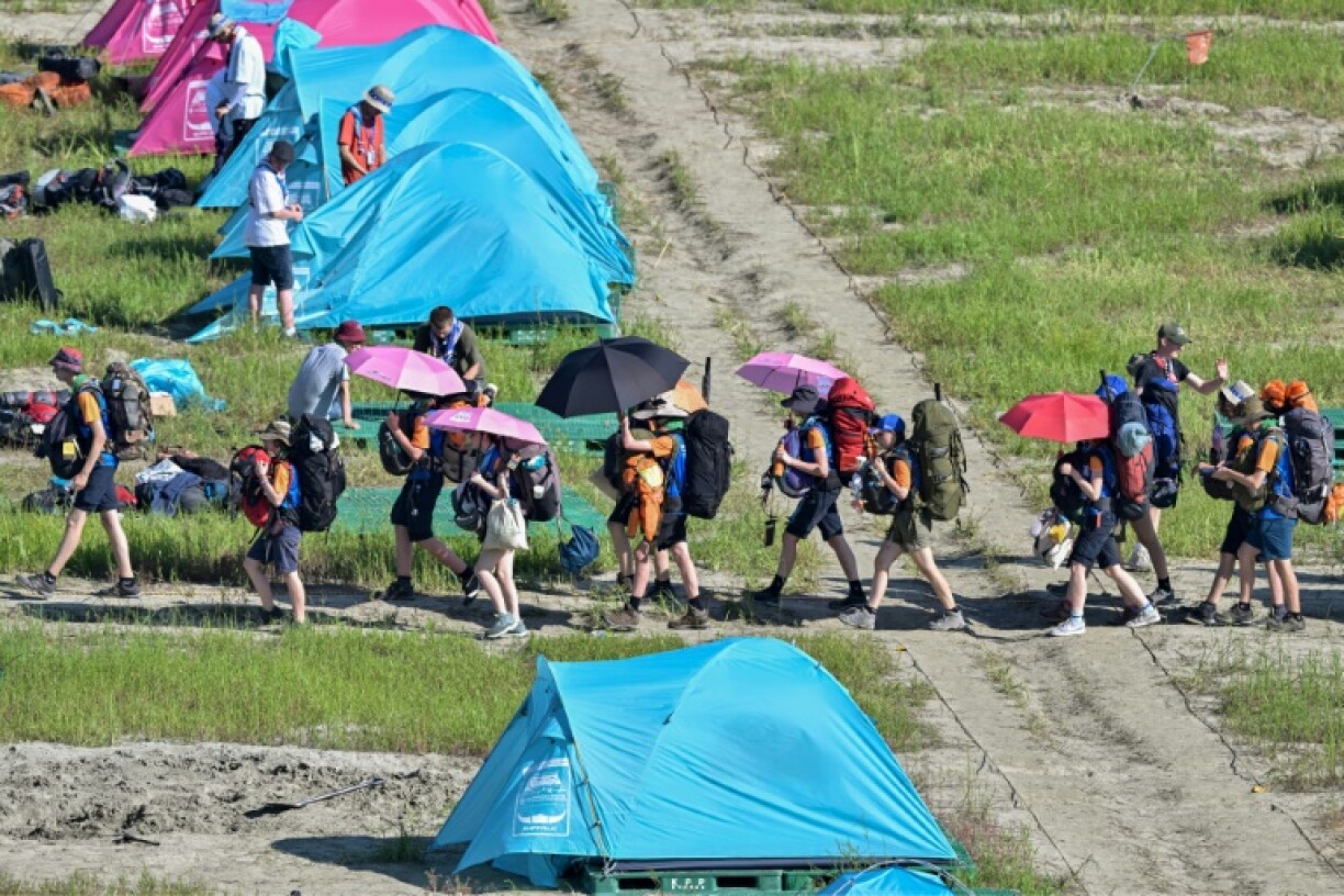 Scouts prepare to leave the campsite of the World Scout Jamboree in Buan, North Jeolla province