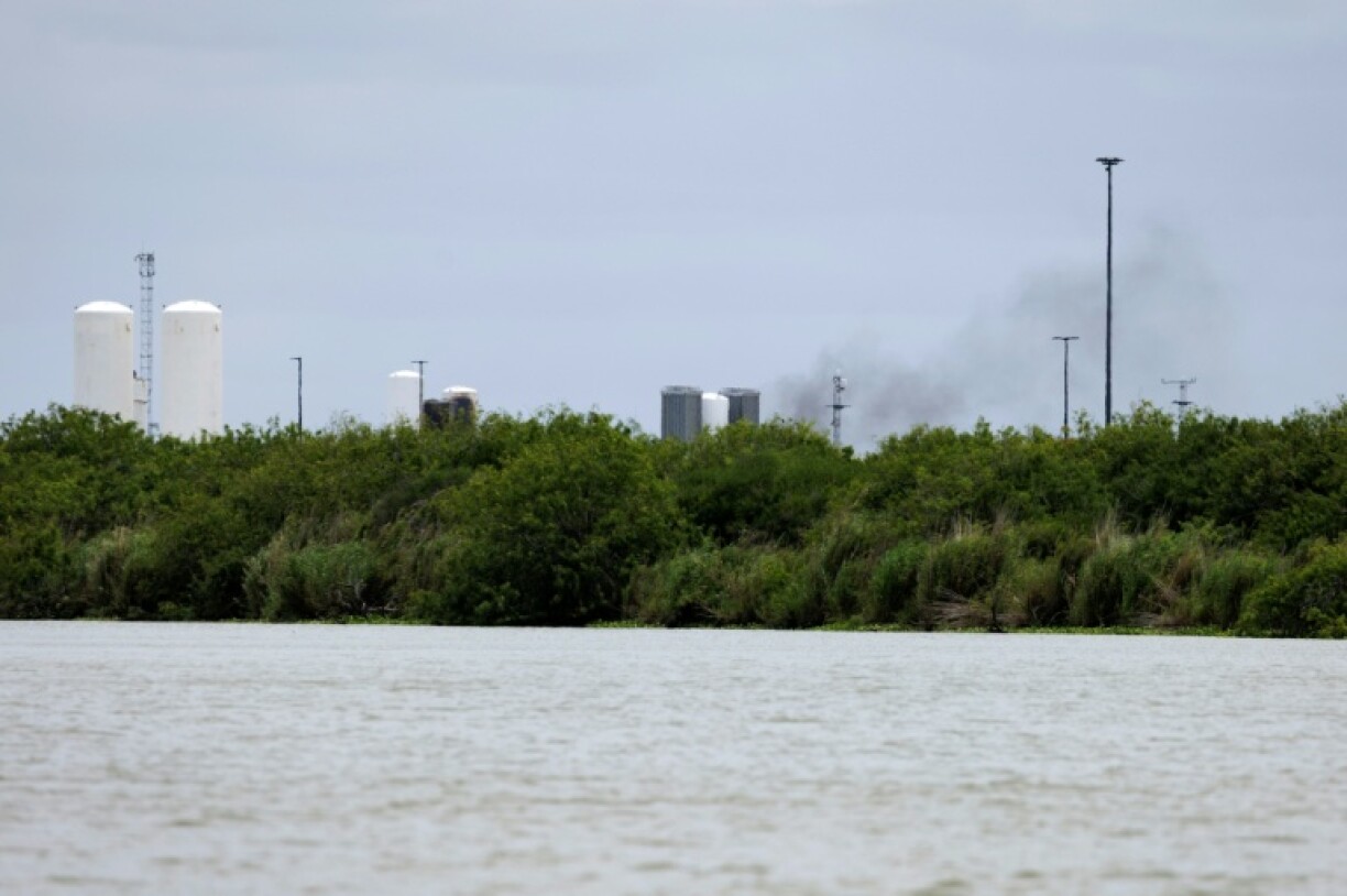 Smoke rises from SpaceX's south Texas worksite after one of Elon Musk's SpaceX Starships exploded during a routine test