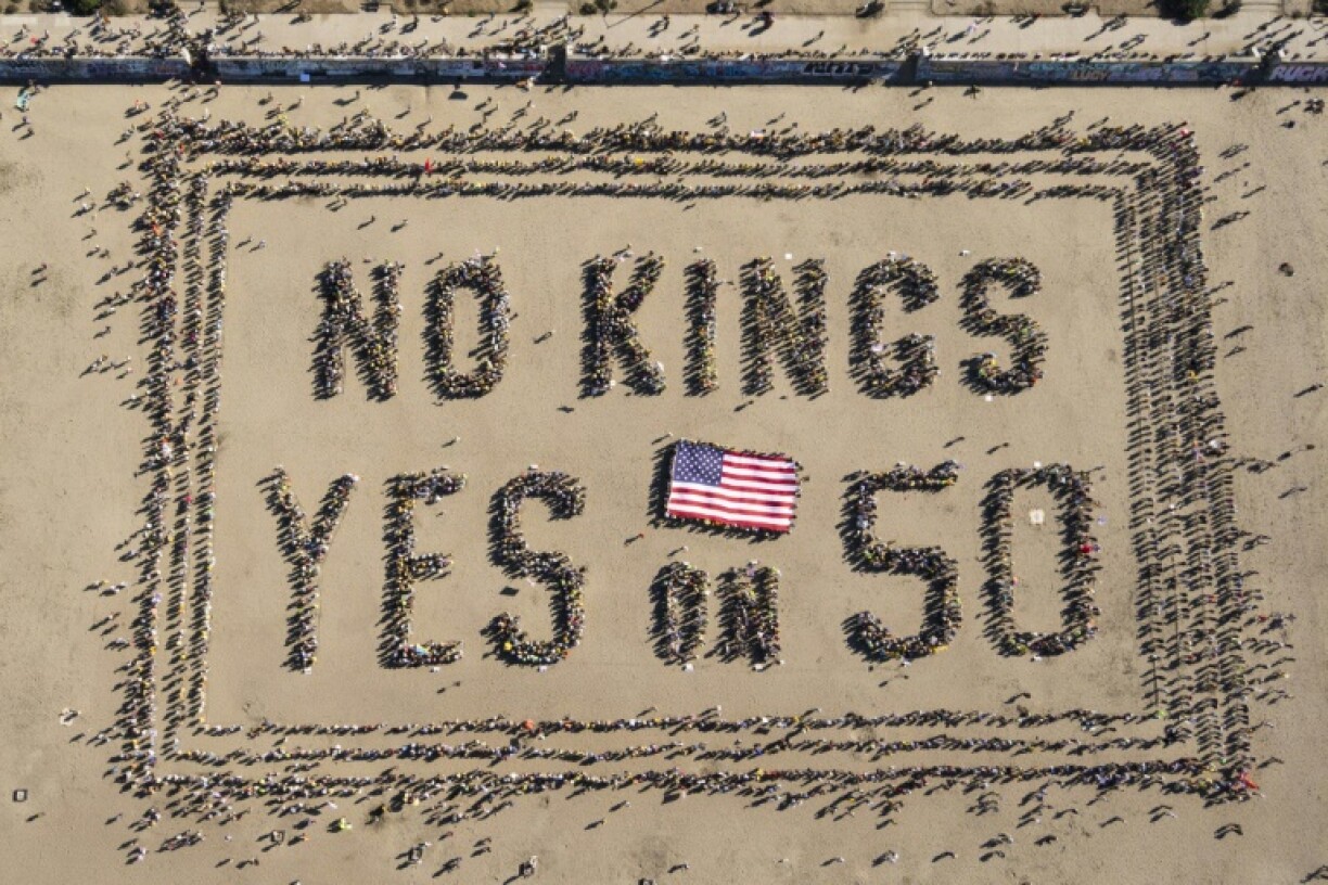 Protesters in San Francisco formed a human banner during their protest, with a message to vote 'yes' on a proposition to redraw congressional districts