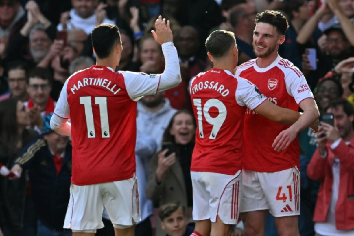 Arsenal's Declan Rice (R) celebrates scoring against Newcastle