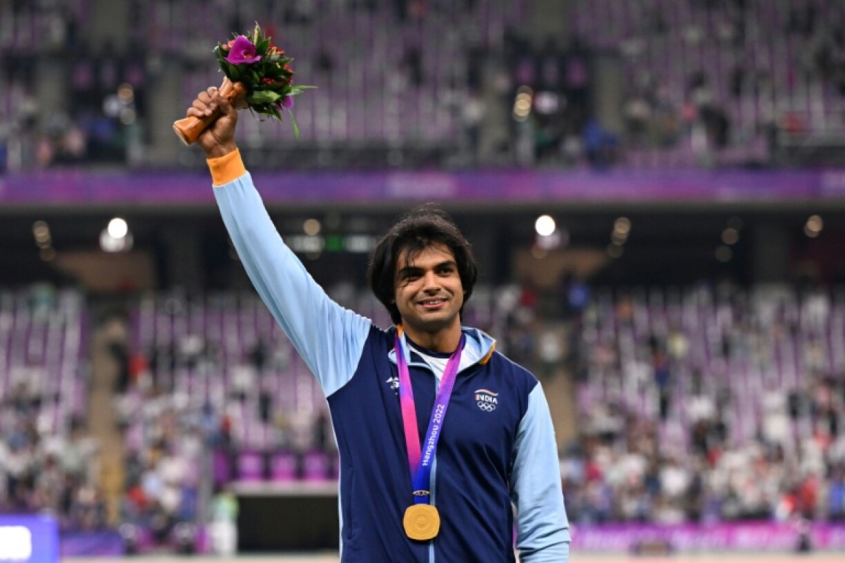 India’s Neeraj Chopra celebrates on the podium during the medal ceremony for the men's javelin at the Asian Games in Hangzhou