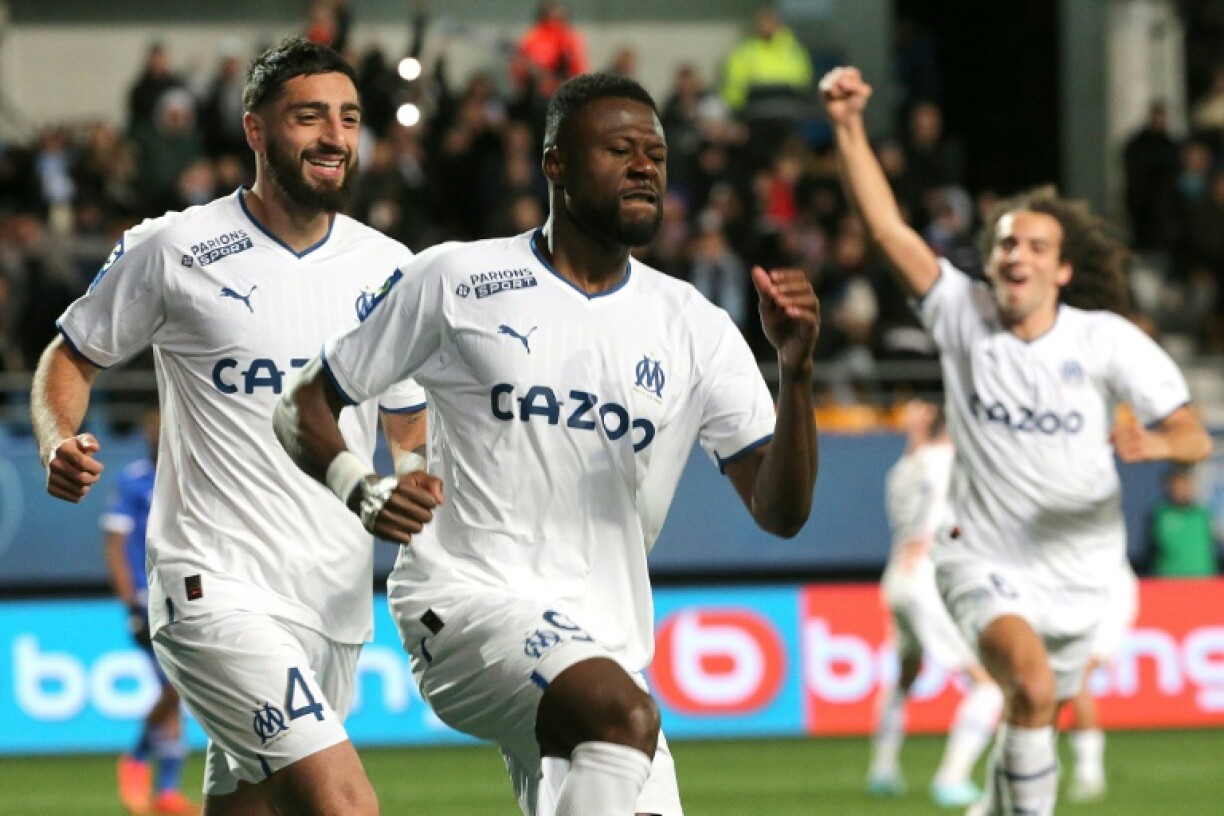 Chancel Mbemba (c) après son but inscrit pour Marseille contre Troyes en Ligue 1 le 11 janvier 2023 à Troyes