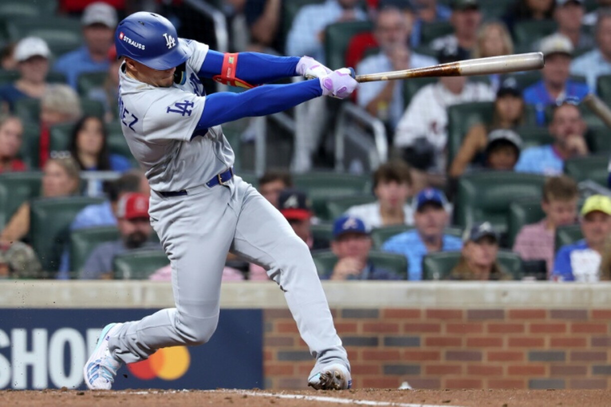 Enrique Hernández of the Los Angeles Dodgers hits a two run home run in the fourth inning in a victory over Atlanta in the Major League Baseball playoffs
