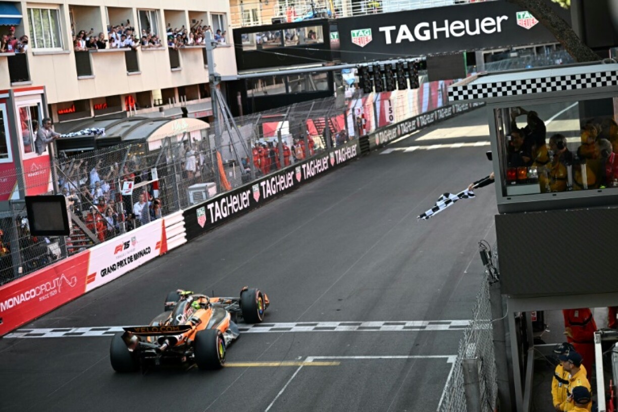 Lando Norris takes the chequered flag at Monaco to reignite his world title bid