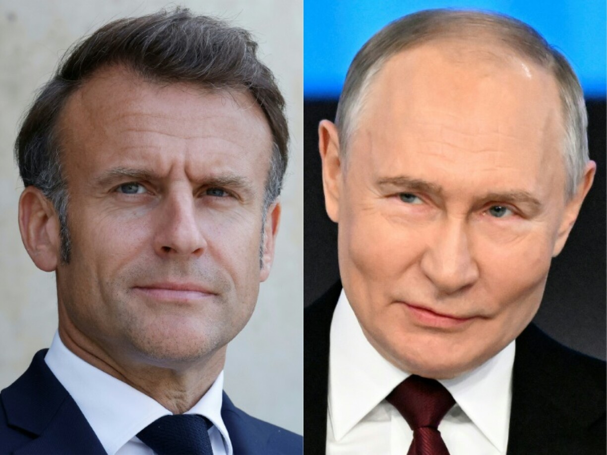 French President Emmanuel Macron (L) urged Russia's Vladimir Putin to agree to a ceasefire in Ukraine 'as soon as possible'