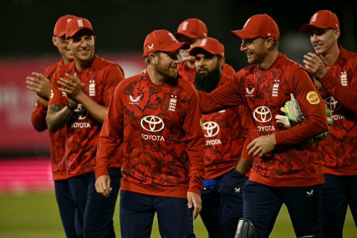 England's Liam Dawson (C) is congratulated after taking four wickets during the hosts' 21-run win over the West Indies in the first T20 International at Chester-le-Street
