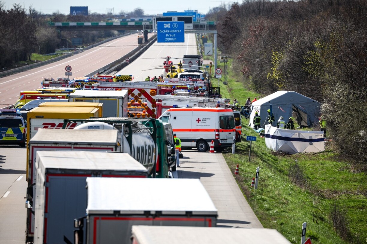 Emergency vehicles and rescue helicopters stand on the A9 highway at the scene of an accident where several persons were killed on March 27, 2024 in Schkeuditz, near Leipzig, eastern Germany.