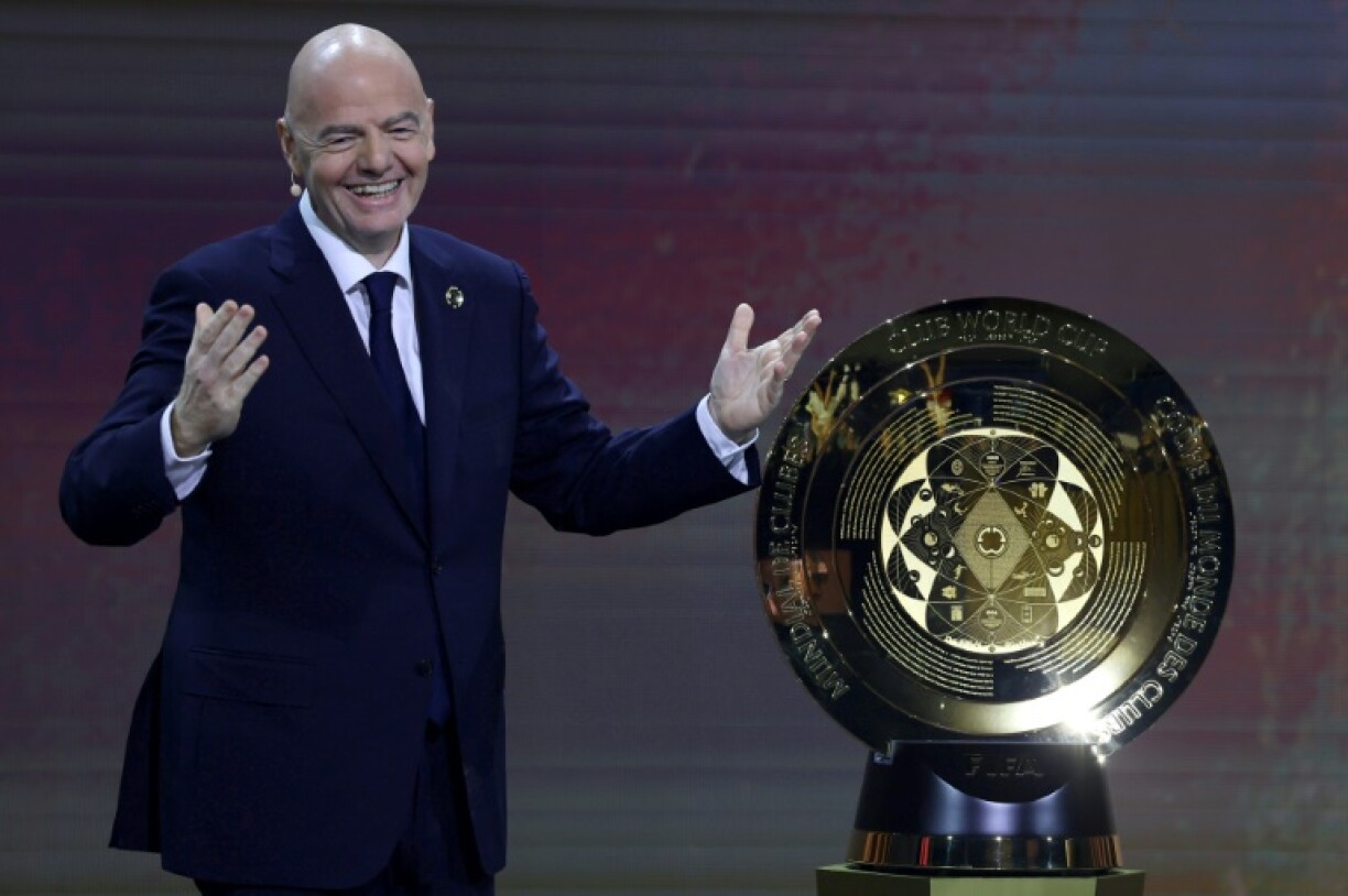 FIFA President Gianni Infantino with the Club World Cup Trophy during draw in December 2024