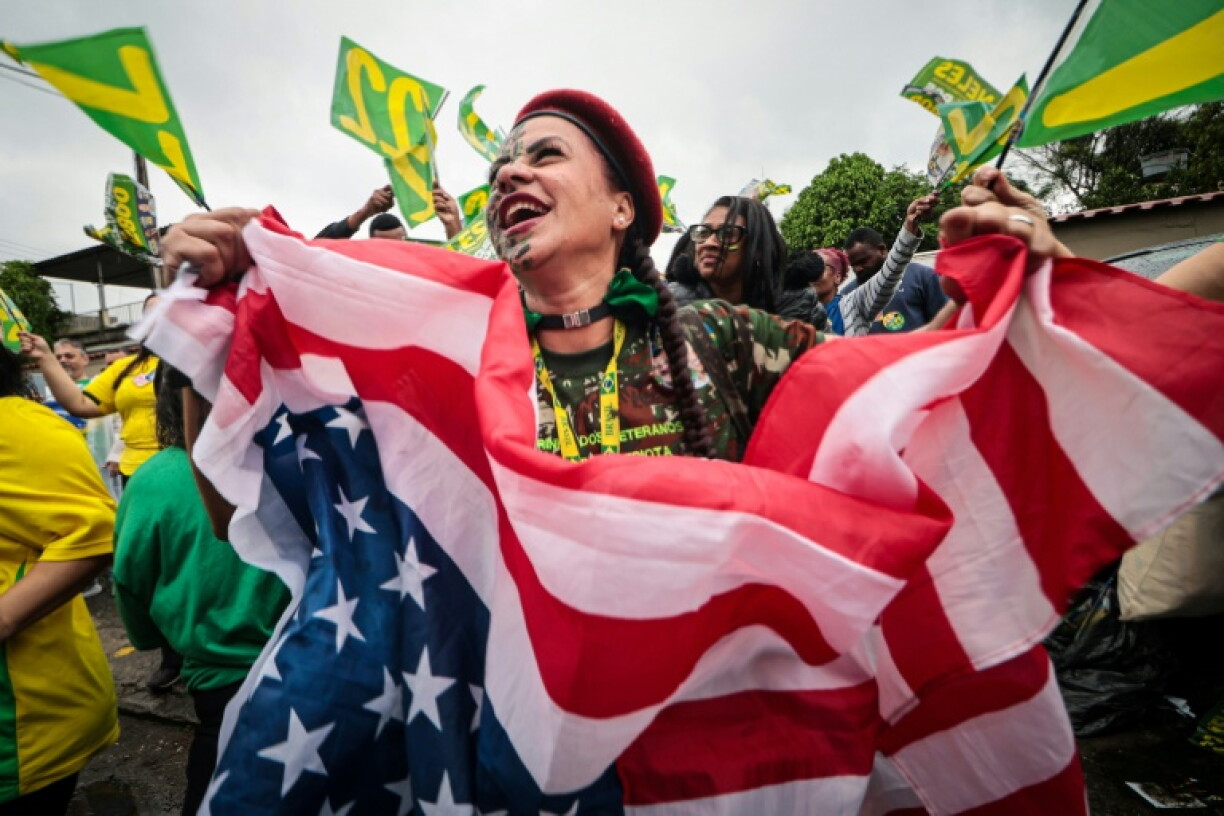 Trump has loomed large over the campaign, and said he is 'very closely' watching the election, but he has not endorsed Flavio Bolsonaro