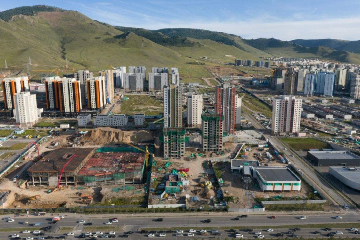 The cable car line will soar over a major thoroughfare, as well as the wide Tuul River floodplain and the Trans-Mongolian Railway but residents say more will be needed to combat pollution and traffic