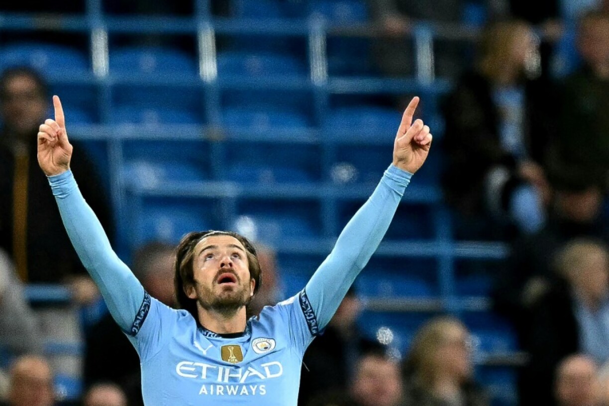 Manchester City's Jack Grealish celebrates scoring against Leicester