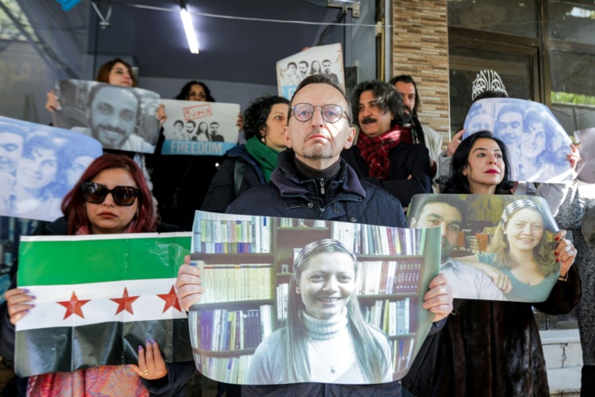 Jaish al-Islam has been accused of abducting four activists, including Razan Zeitouneh (C) in 2013