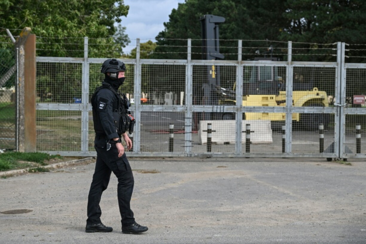 Armed officers could be seen guarding the entrance to the base