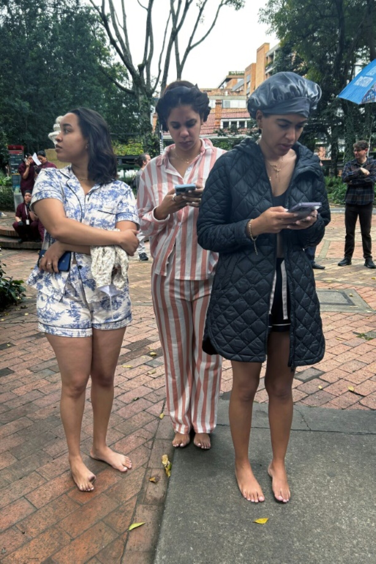 Thousands of Bogotanos raced downstairs and out of buildings still wearing their pajamas