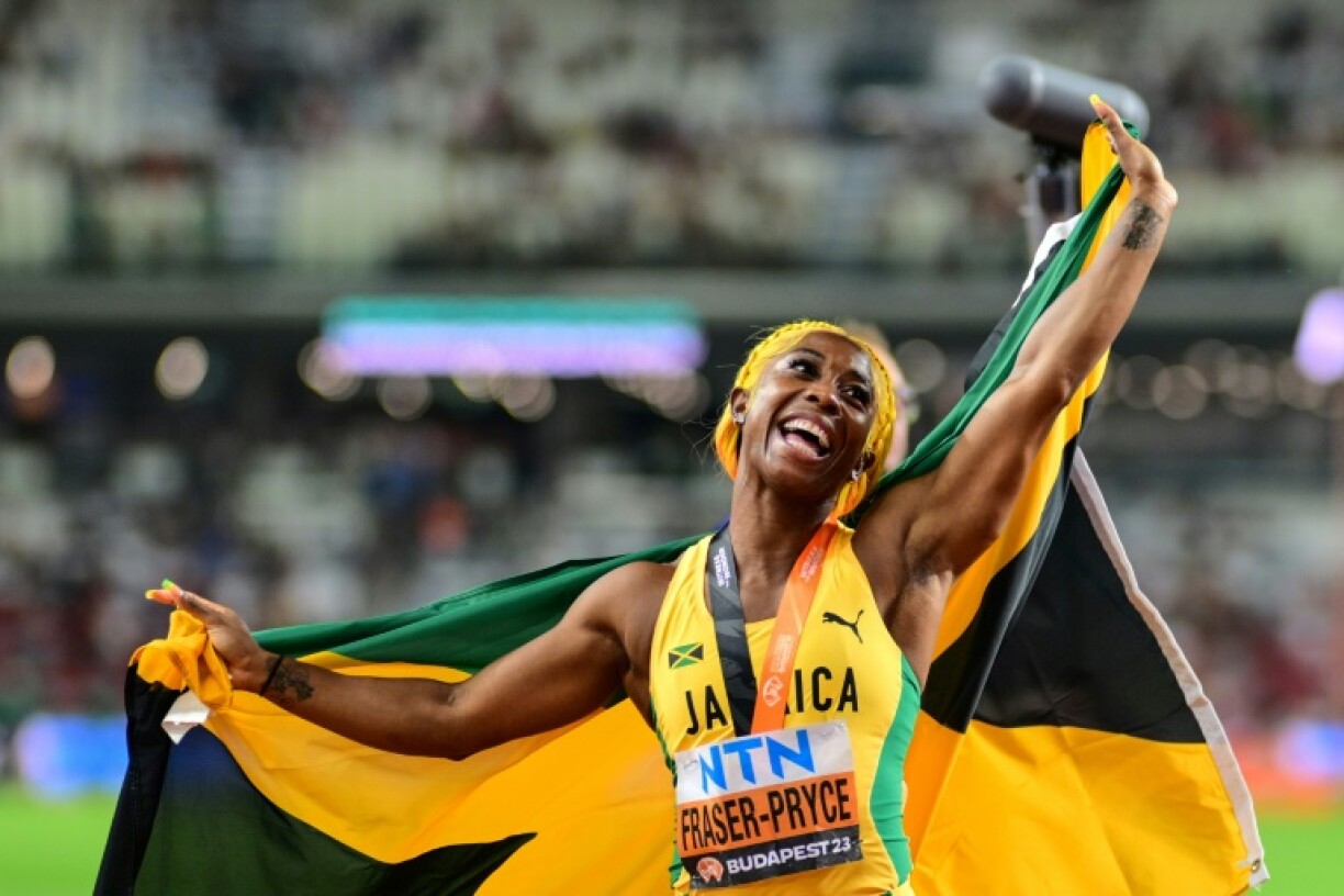 Jamaica's Shelly-Ann Fraser-Pryce celebrates after finishing third in the 100m at the 2023 worlds in Budapest