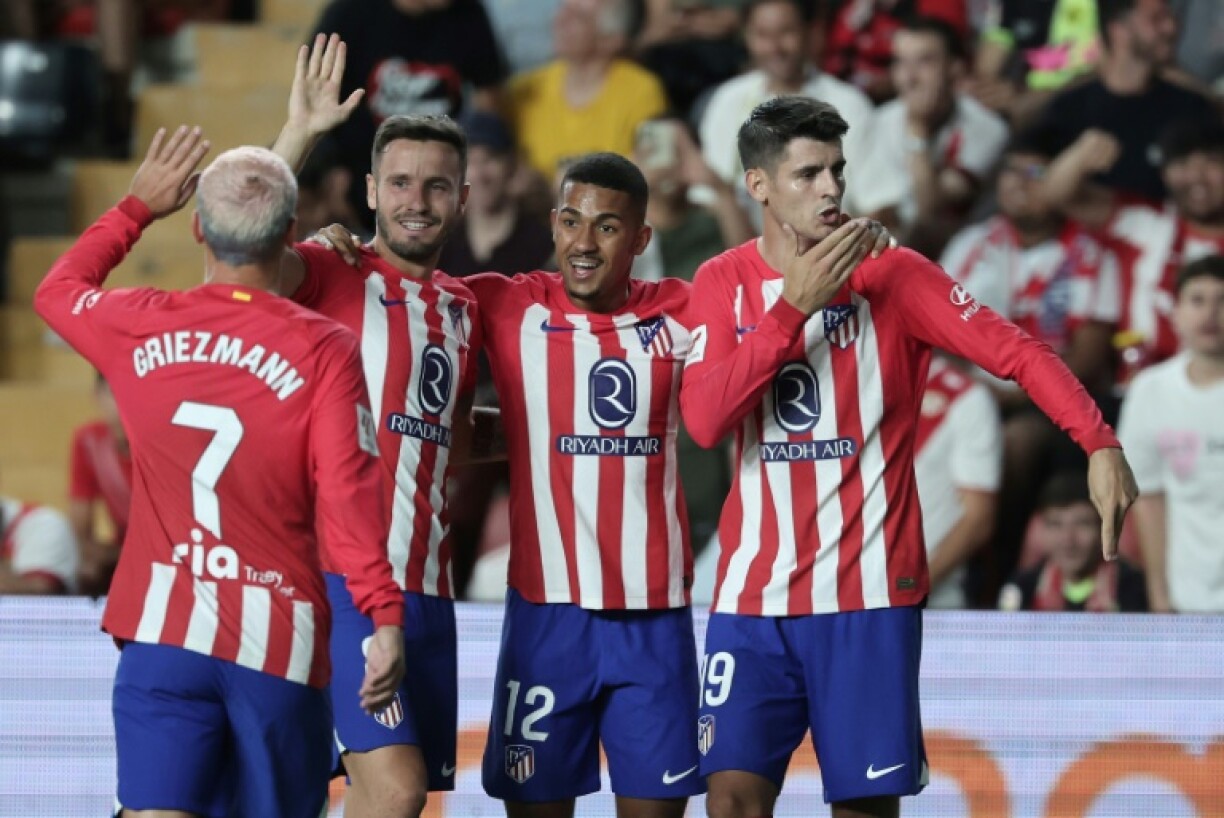 La joie des joueurs de l'Atlético Madrid après l'un des deux buts d'Alvaro Morata (d), lors de la victoire 7-0 chez le Rayo Vallecano, le 28 août 2023