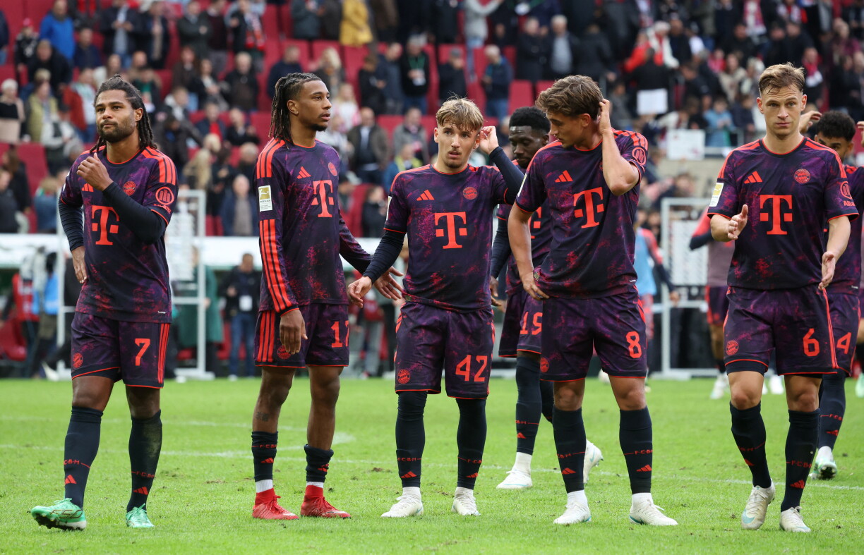 (From L) Bayern Munich's German forward #07 Serge Gnabry, Bayern Munich's French midfielder #17 Michael Olise, Bayern Munich's German midfielder #42 Lennart Karl, Bayern Munich's Canadian defender #19 Alphonso Davies, Bayern Munich's German midfielder #08 Tom Bischof and Bayern Munich's German midfielder #06 Joshua Kimmich react after the German first division Bundesliga football match between FC Augsburg and FC Bayern Munich in Augsburg, southern Germany on October 10, 2026.