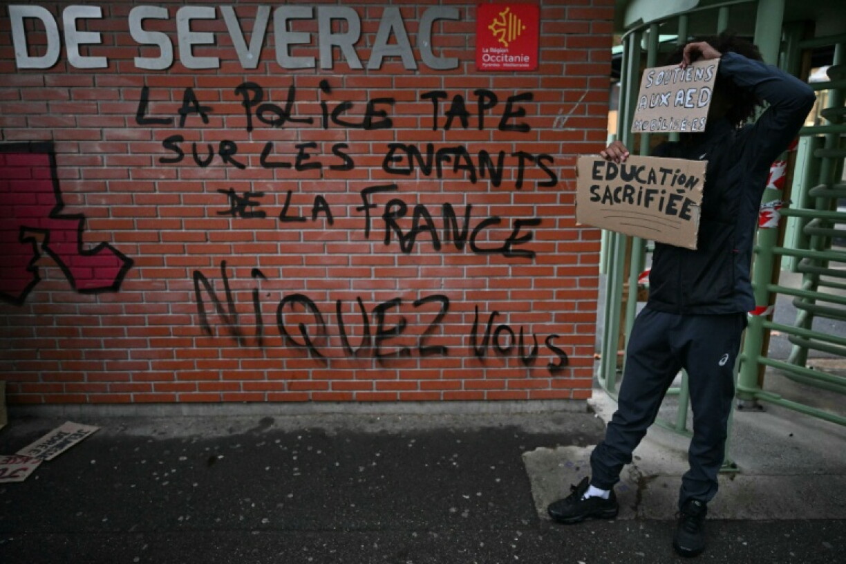 In Toulouse graffiti on a school wall read: 'The police are cracking down on France's children'