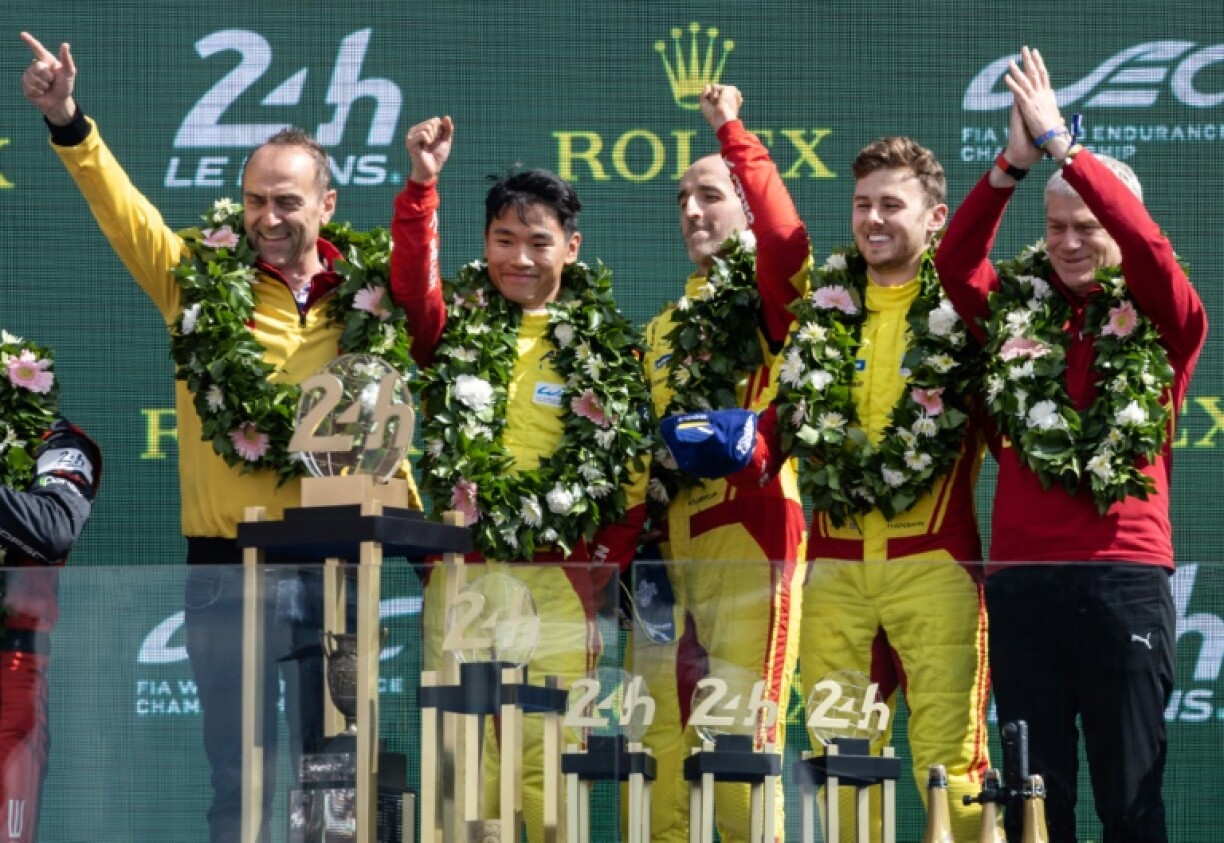 The AF Corse's Ferrari-powered team celebrate their victory at the 2025 Le Mans: (From L) Team principal Amato Ferrari, Ye Yifei, Robert Kubica, Philip Hanson and director Antonello Coletta