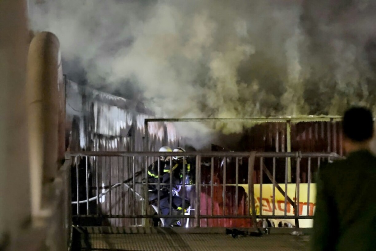 Witnesses told state media the fire was too fierce for them to attempt to rescue those inside
