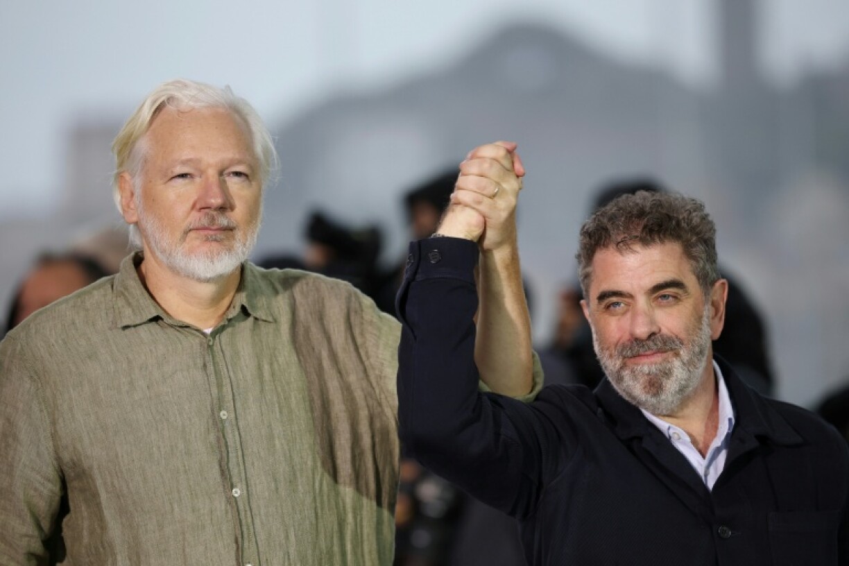 Wikileaks founder Julian Assange (left) and US filmmaker Eugene Jarecki at Cannes