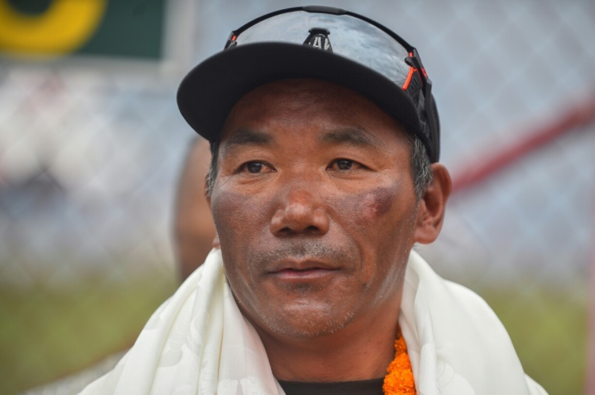 Nepali guide Kami Rita Sherpa reached the peak of the world's highest mountain for a record 31st time on Tuesday