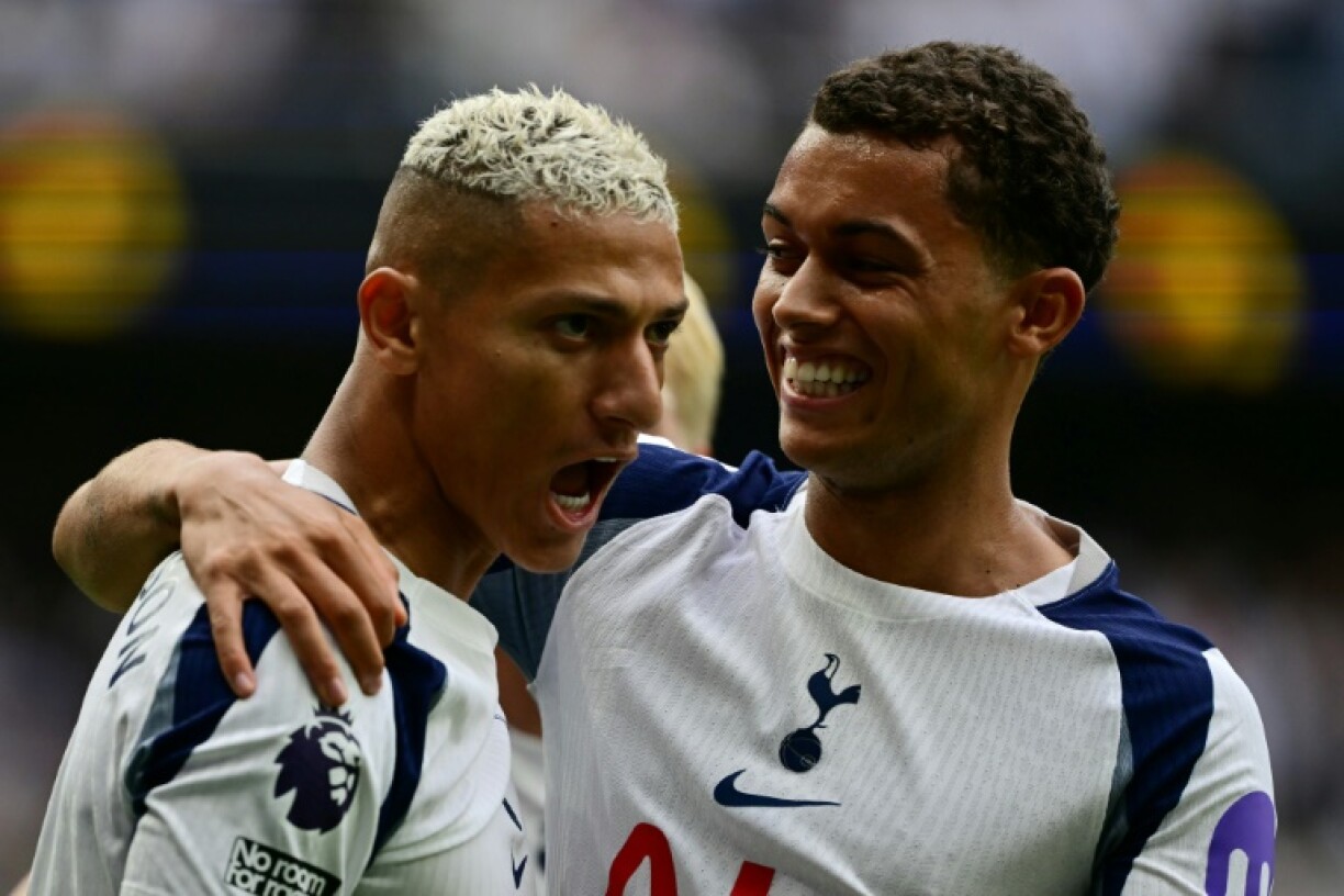 Richarlison (L) scored twice and Brennan Johnson once as Tottenham opened their Premier League season with a 3-0 win over Burnley