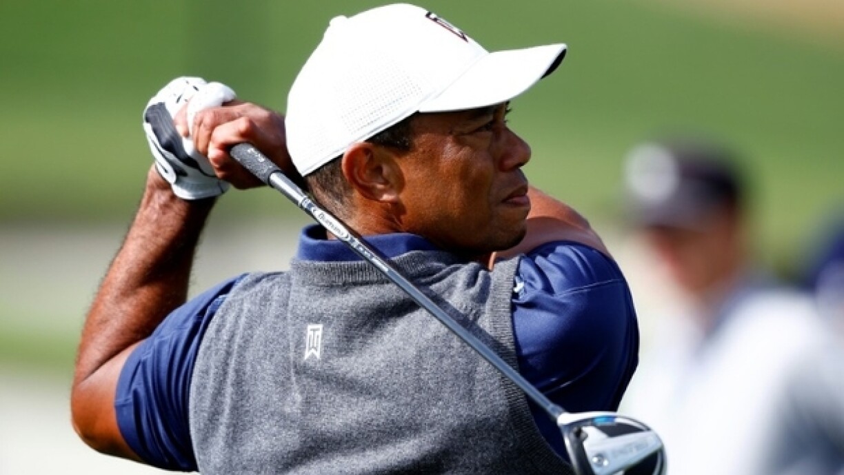 Le golfeur américain Tier Woods au practice avant le tournoi Genesis Invitational, à Pacific Palisades (Californie), le 14 février 2023