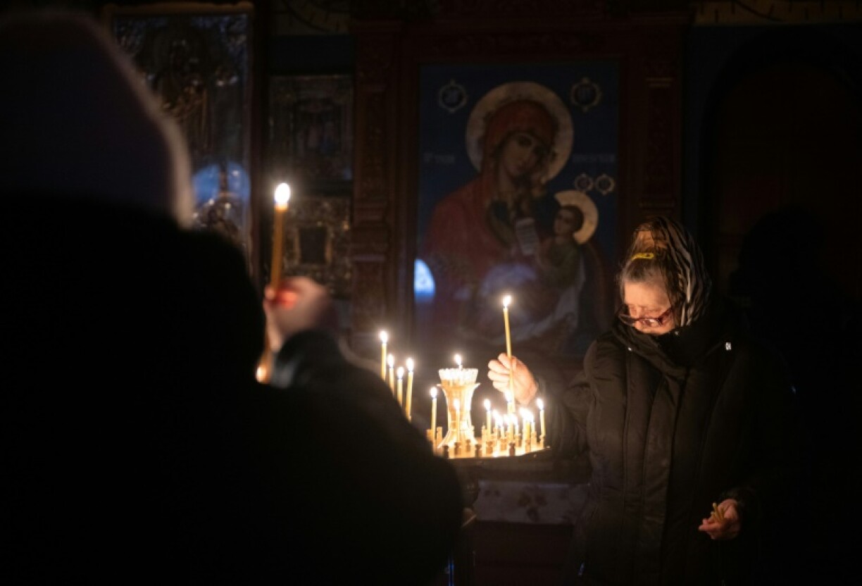Many near the eastern front find respite in familiar religious rites