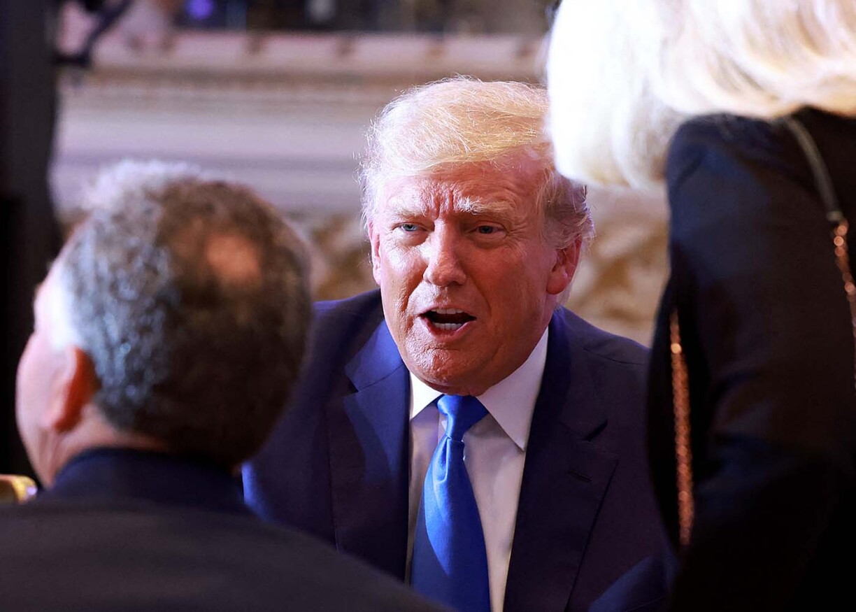 Former U.S. President Donald Trump mingles with supporters during an election night event at Mar-a-Lago on November 08, 2022 in Palm Beach, Florida. Trump addressed his supporters as the nation awaits the results of the midterm elections.