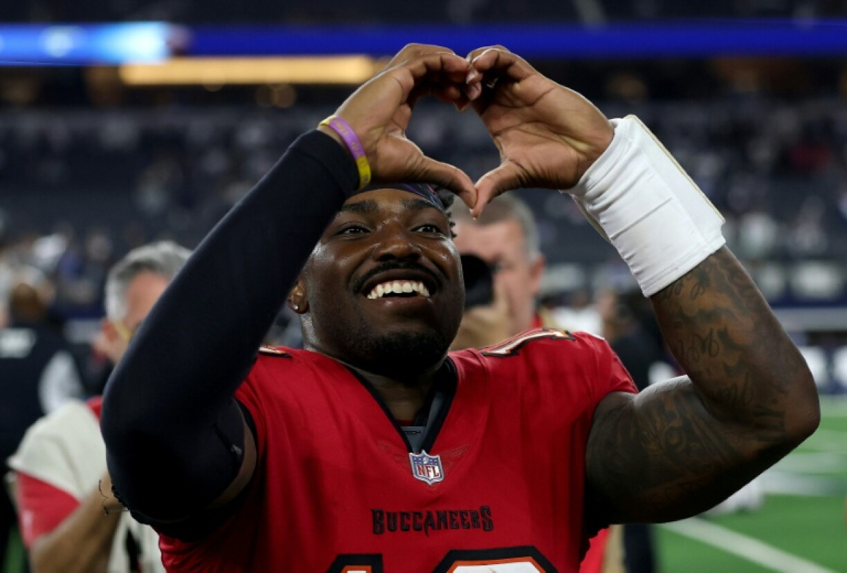 Tampa Bay quarterback Jalon Daniels celebrates after leading the Buccaneers to an upset NFL win over the Dallas Cowboys