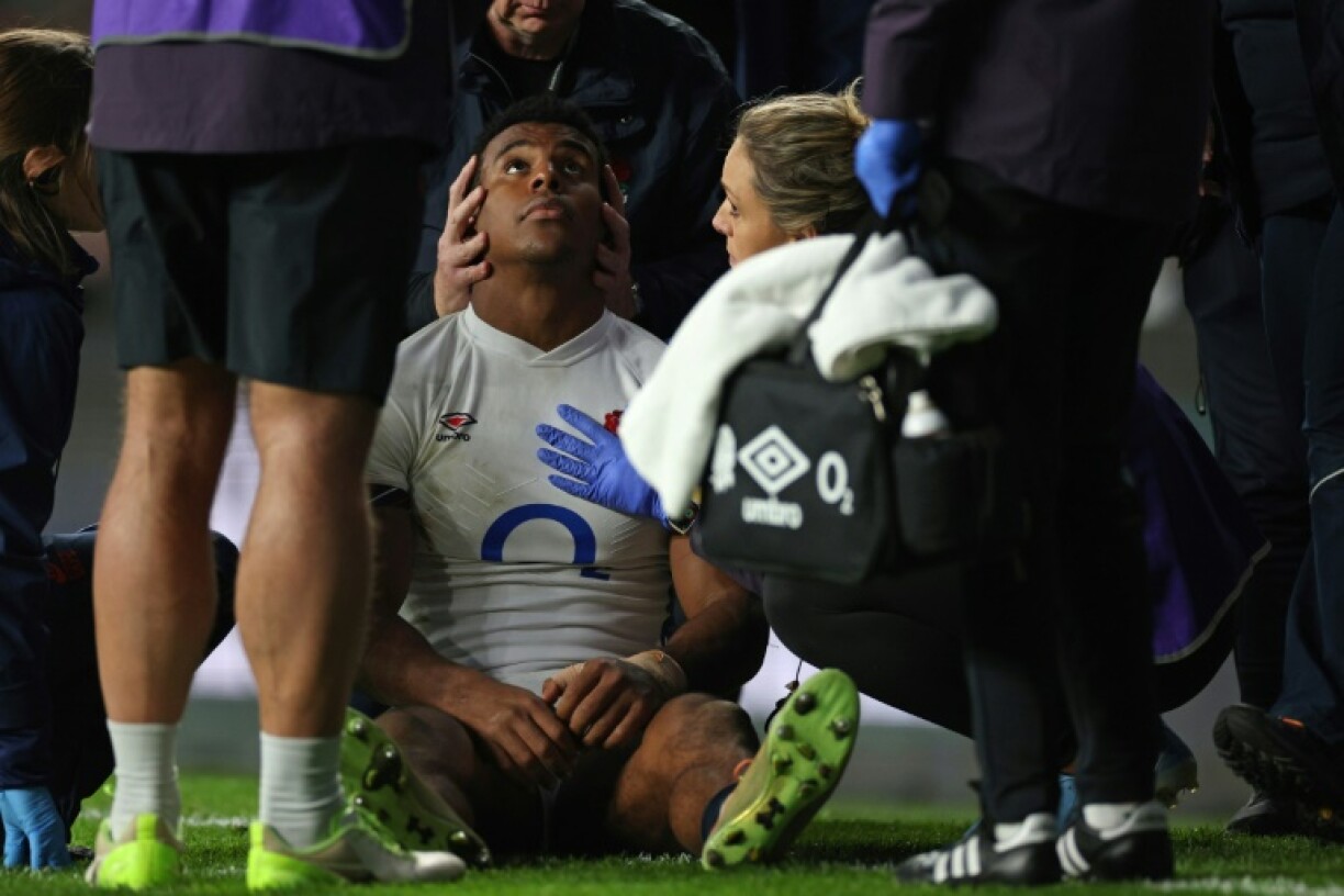 England wing Immanuel Feyi-Waboso receives medical treatment