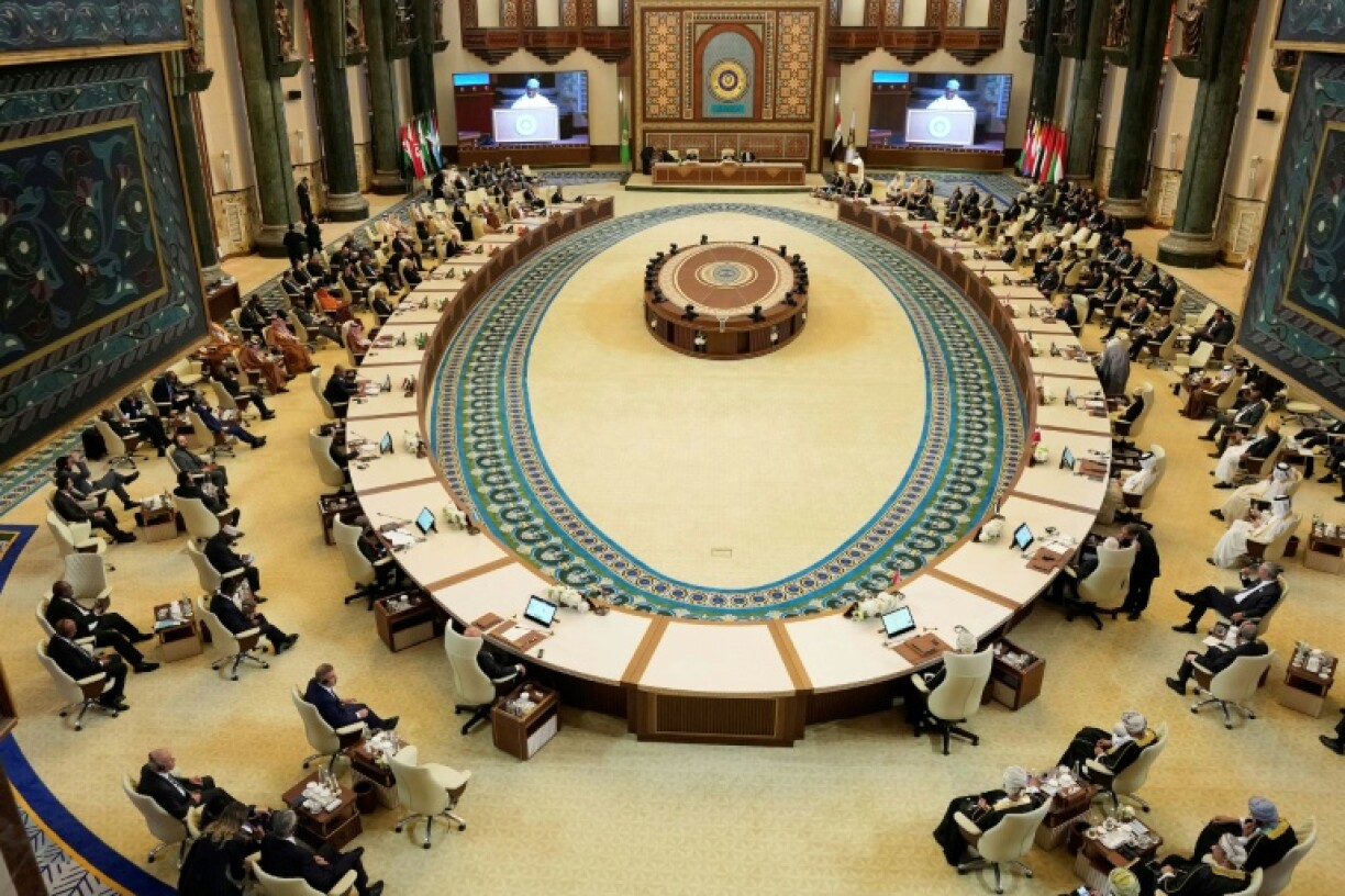 Arab leaders attend the opening session of the 34th Arab League summit in Baghdad