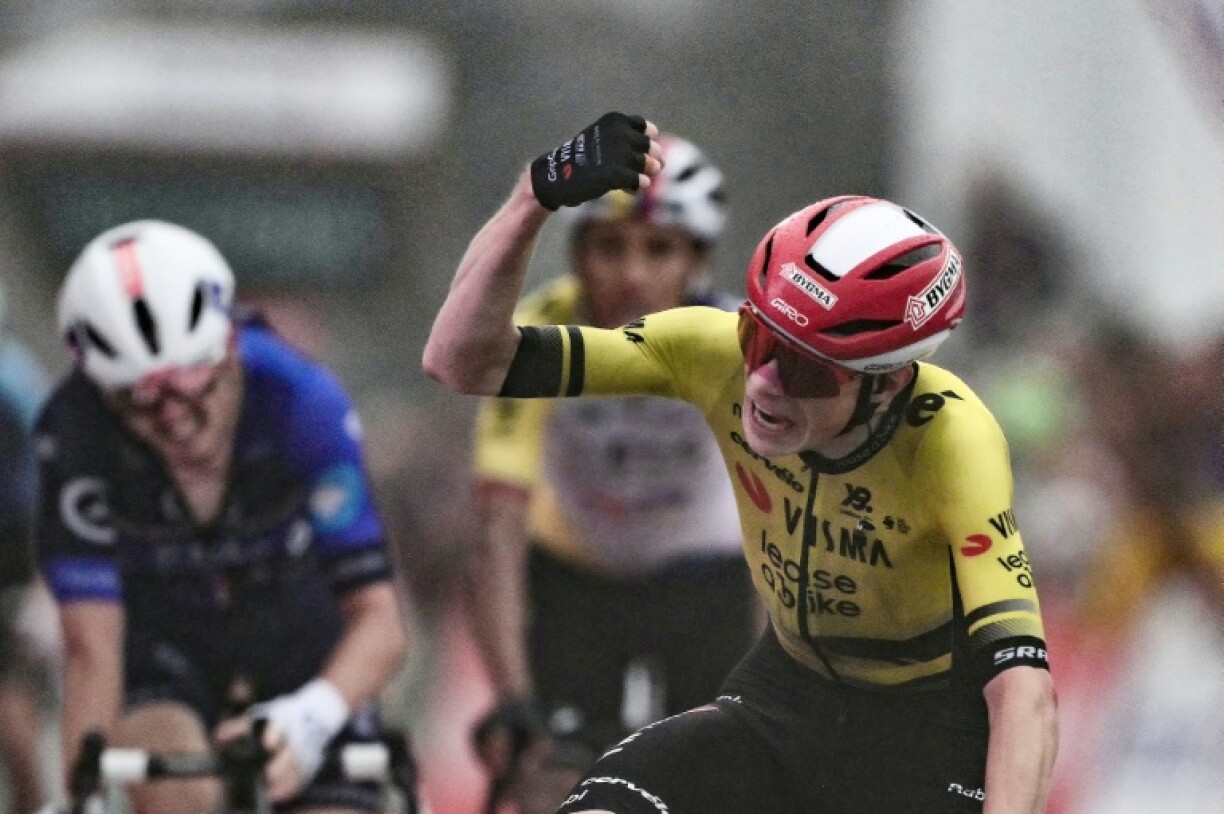 Jonas Vingegaard celebrates victory on stage two