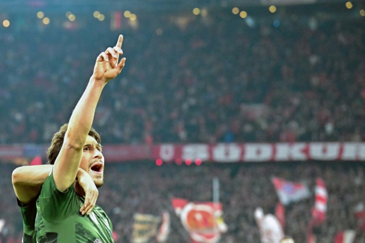 Nicolas Kuhn was among the goalscorers as Celtic eased to their fourth successive Scottish Premiership title in a 5-0 rout of Dundee United